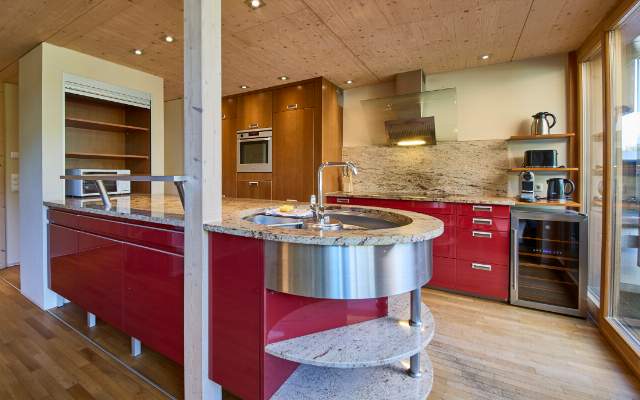 Fully equipped kitchen with a built-in wine refrigerator