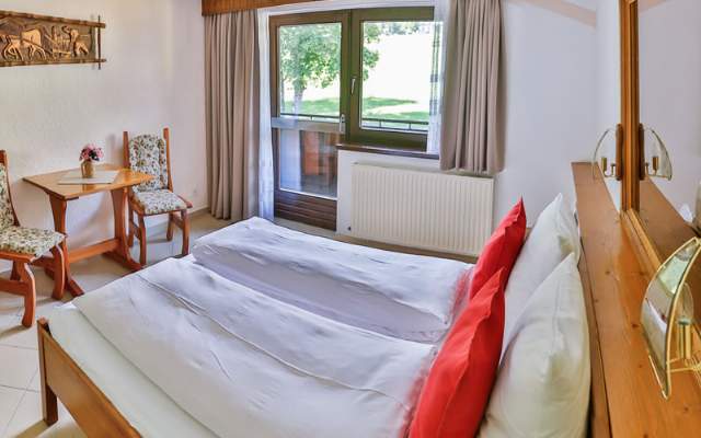 Cozy rooms and apartments—with a choice of breakfast buffet or half-board