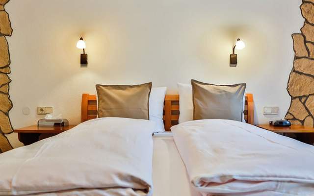 Cozy rooms and apartments—with a choice of breakfast buffet or half-board