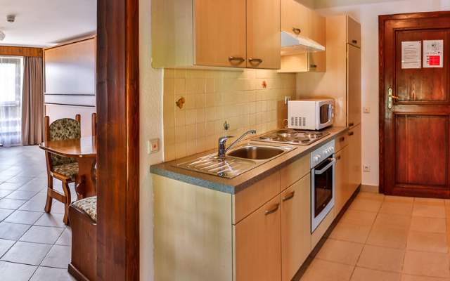 Cozy rooms and apartments—with a choice of breakfast buffet or half-board