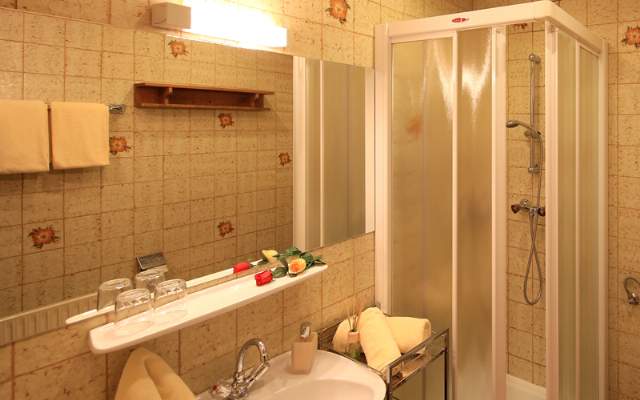 Cozy rooms and apartments—with a choice of breakfast buffet or half-board