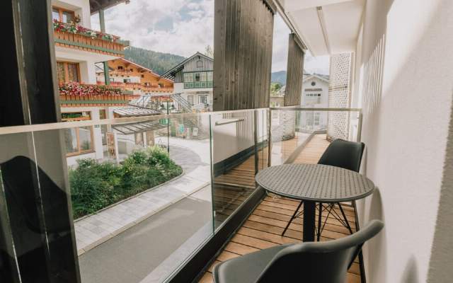 Balcony with a view of Flachau's village square